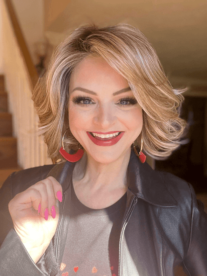 Sandy @i_be_wiggin wearing CROWD PLEASER by RAQUEL WELCH WIGS in color RL14/22SS SHADED WHEAT | Dark Blonde Evenly Blended with Platinum Blonde and Dark Roots